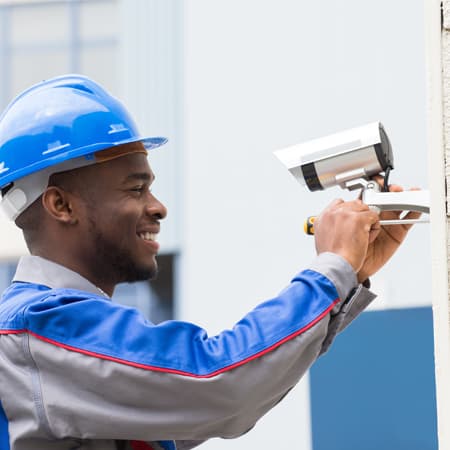Close-up of hands working with wires